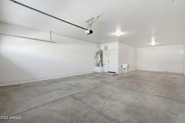 a view of a house with a snow on the road