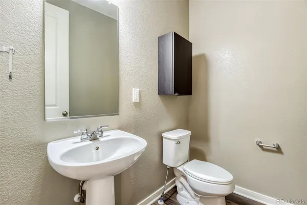 an empty room with windows and entrance