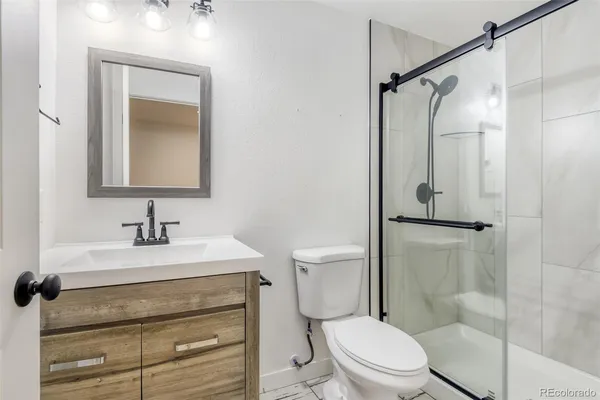a view of a bathroom with a sink and a toilet