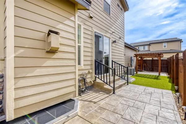 a view of a chairs with a back yard