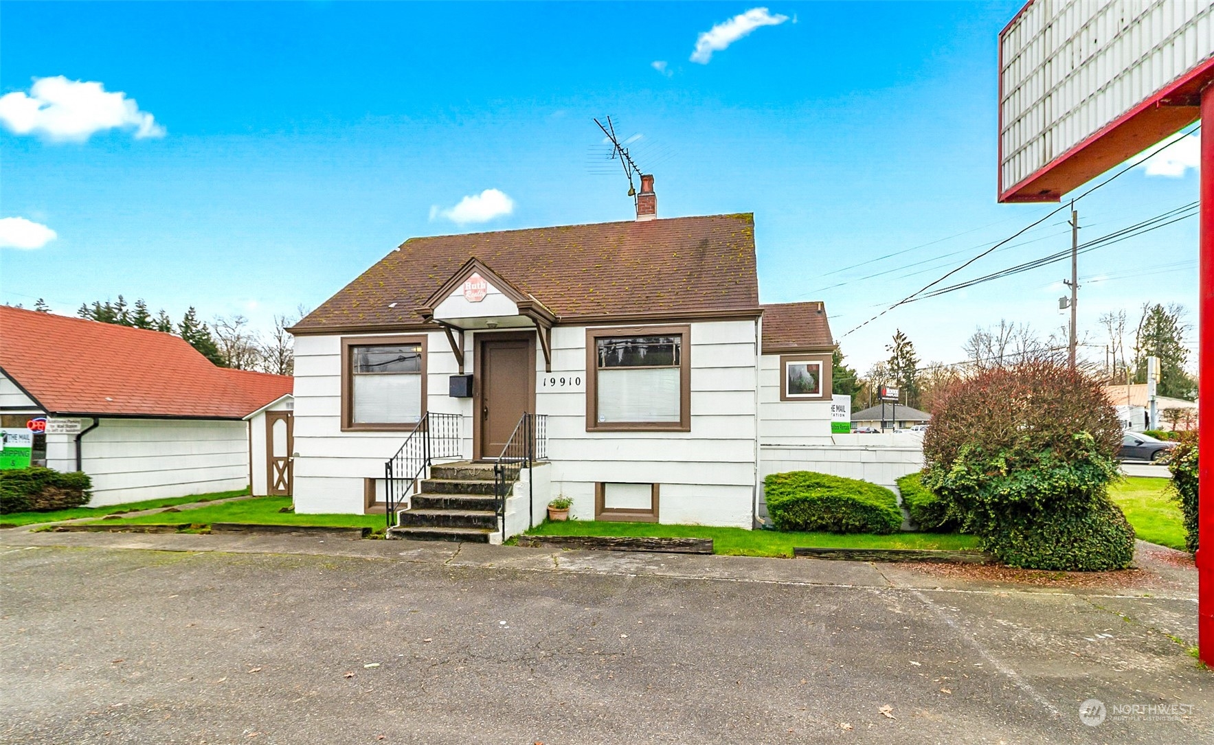 19910 Old Owen Road Monroe, WA 98272 - Photo 17 of 22 a front view of a house with a yard and garage