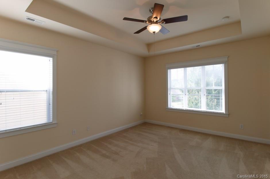 14058 Stumptown Road Huntersville, NC 28078 - Photo 11 of 14 a view of an empty room with a window