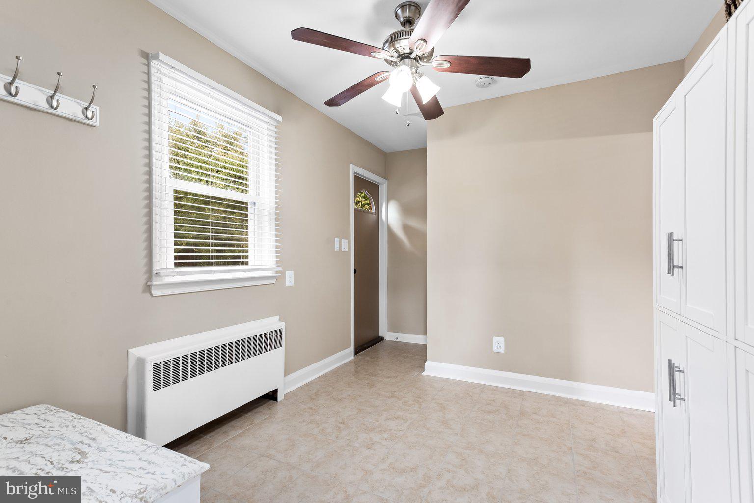 8335 Liberty Road Windsor Mill, MD 21244 - Photo 16 of 57 a view of an empty room with a window