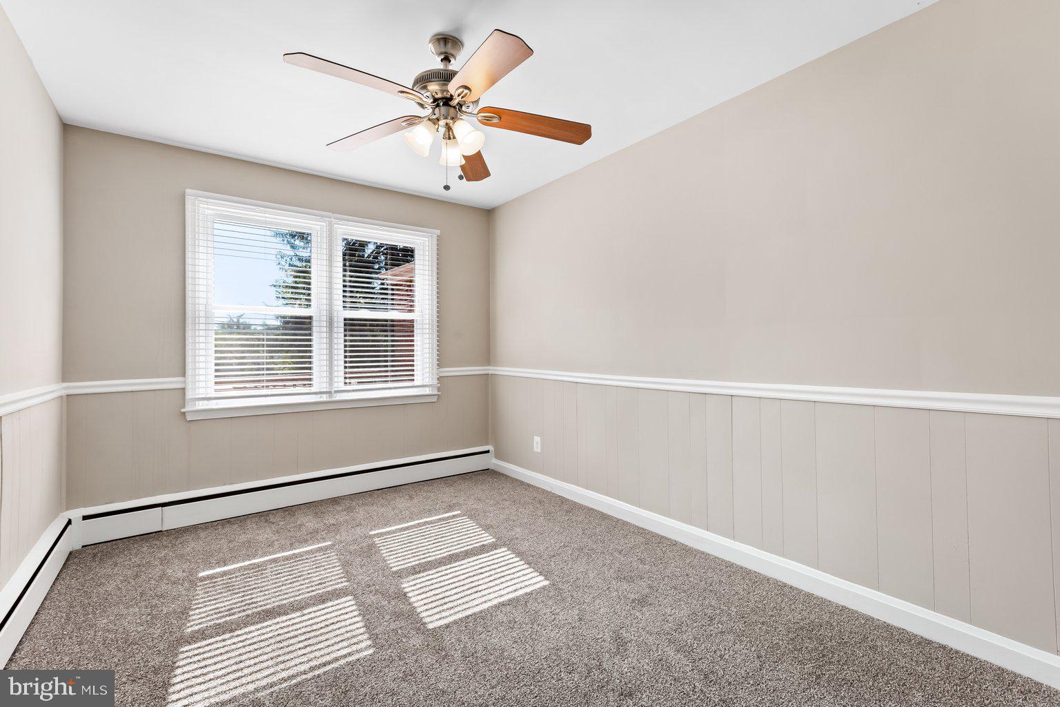 8335 Liberty Road Windsor Mill, MD 21244 - Photo 27 of 57 a view of an empty room with a window