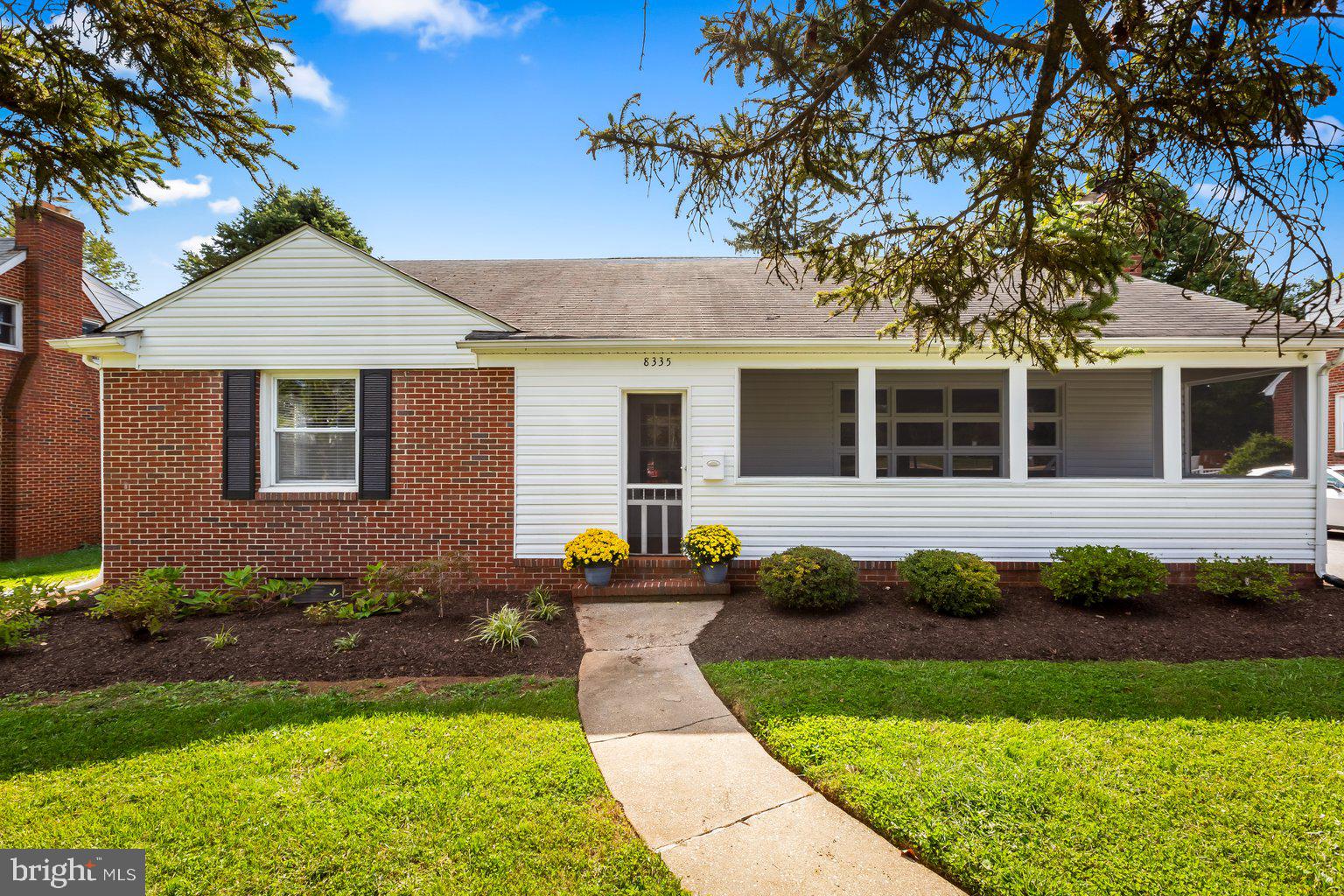 8335 Liberty Road Windsor Mill, MD 21244 - Photo 5 of 57 a front view of a house with garden