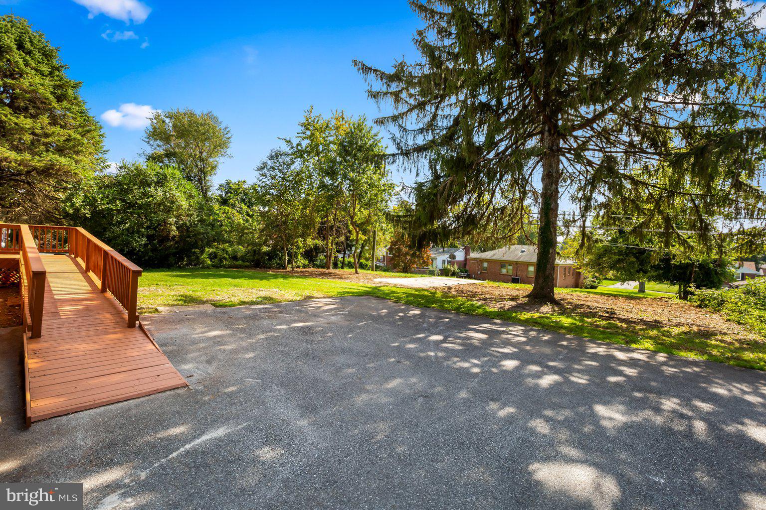 8335 Liberty Road Windsor Mill, MD 21244 - Photo 52 of 57 a view of swimming pool with an outdoor space and seating area