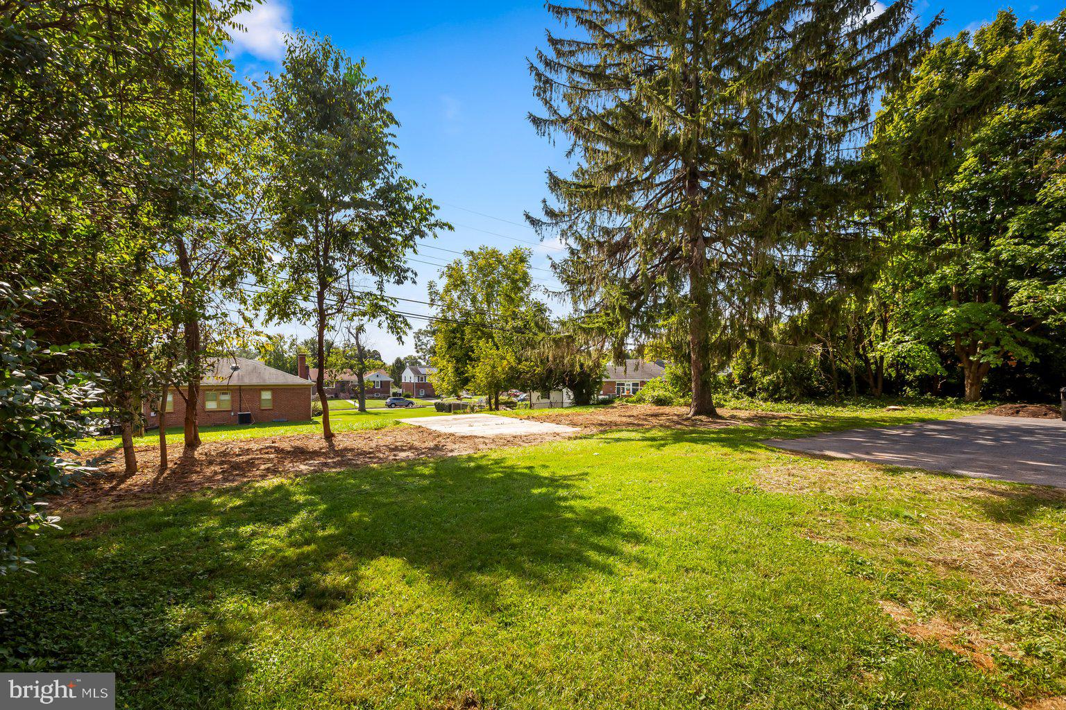 8335 Liberty Road Windsor Mill, MD 21244 - Photo 53 of 57 a view of swimming pool with an outdoor space and seating area