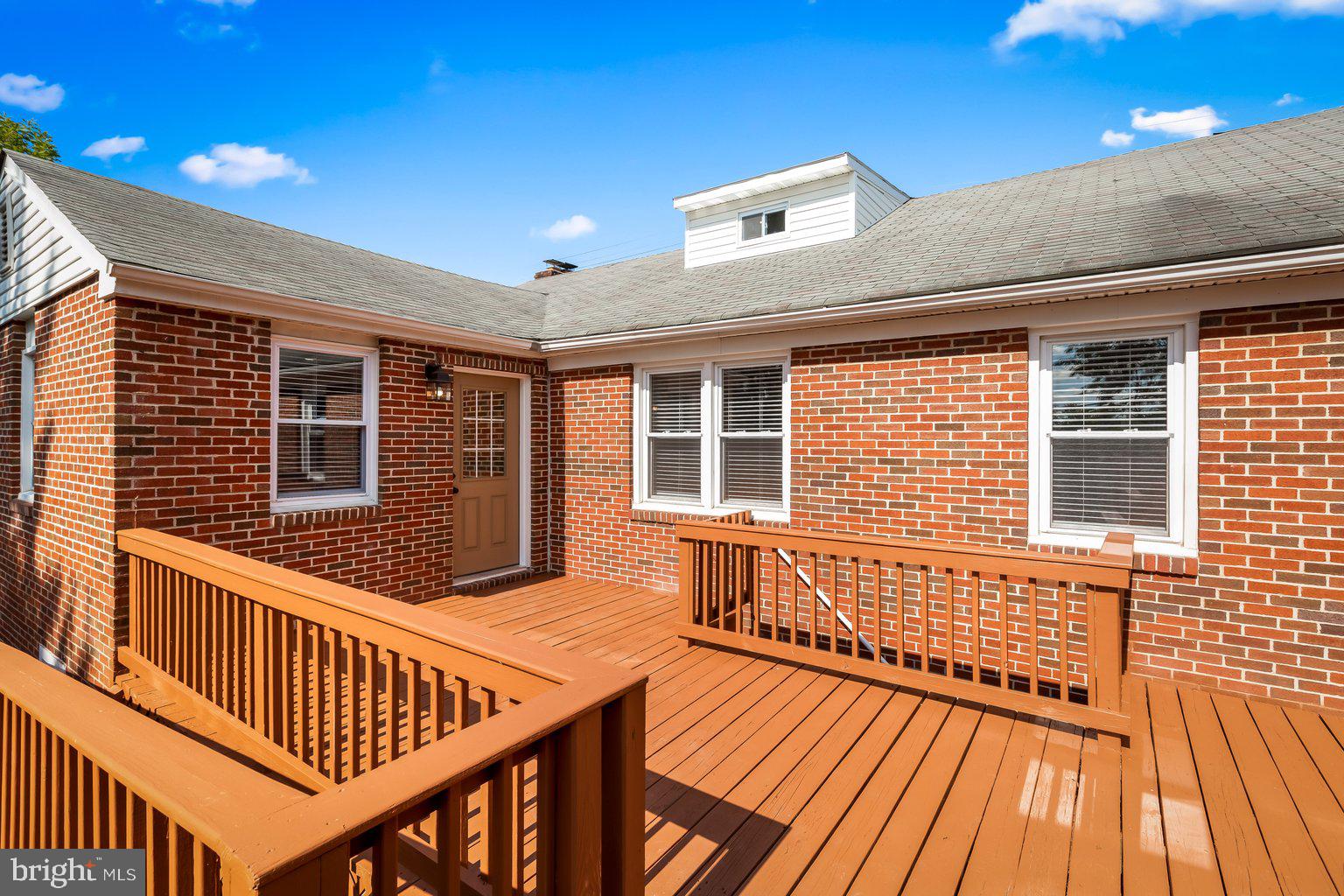 8335 Liberty Road Windsor Mill, MD 21244 - Photo 55 of 57 a view of a house with wooden deck