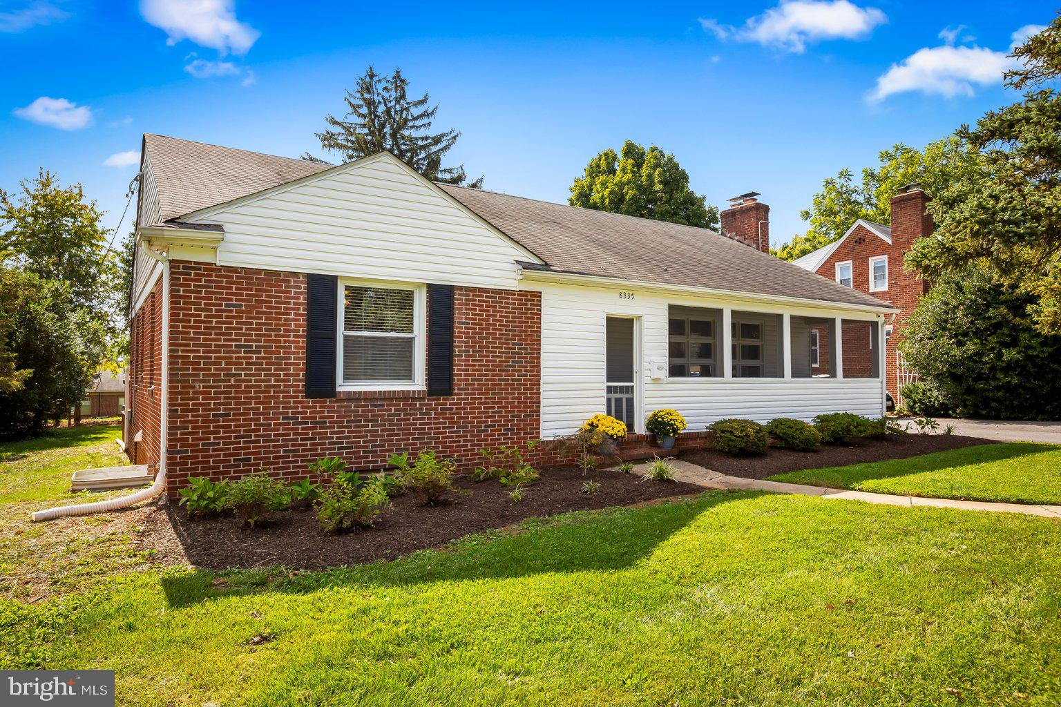 8335 Liberty Road Windsor Mill, MD 21244 - Photo 6 of 57 a front view of a house with garden