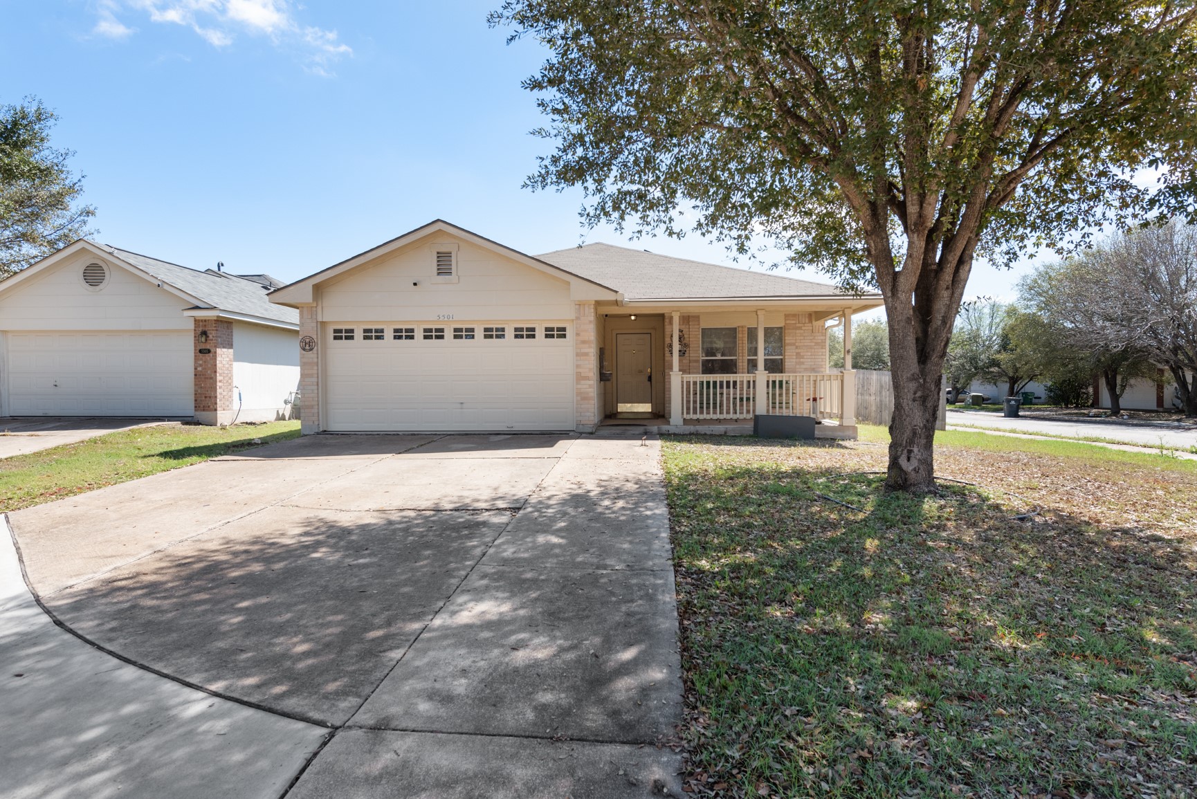 5501 English Avenue Austin, TX 78724 - Photo 18 of 19 a view of a house with a yard and large tree