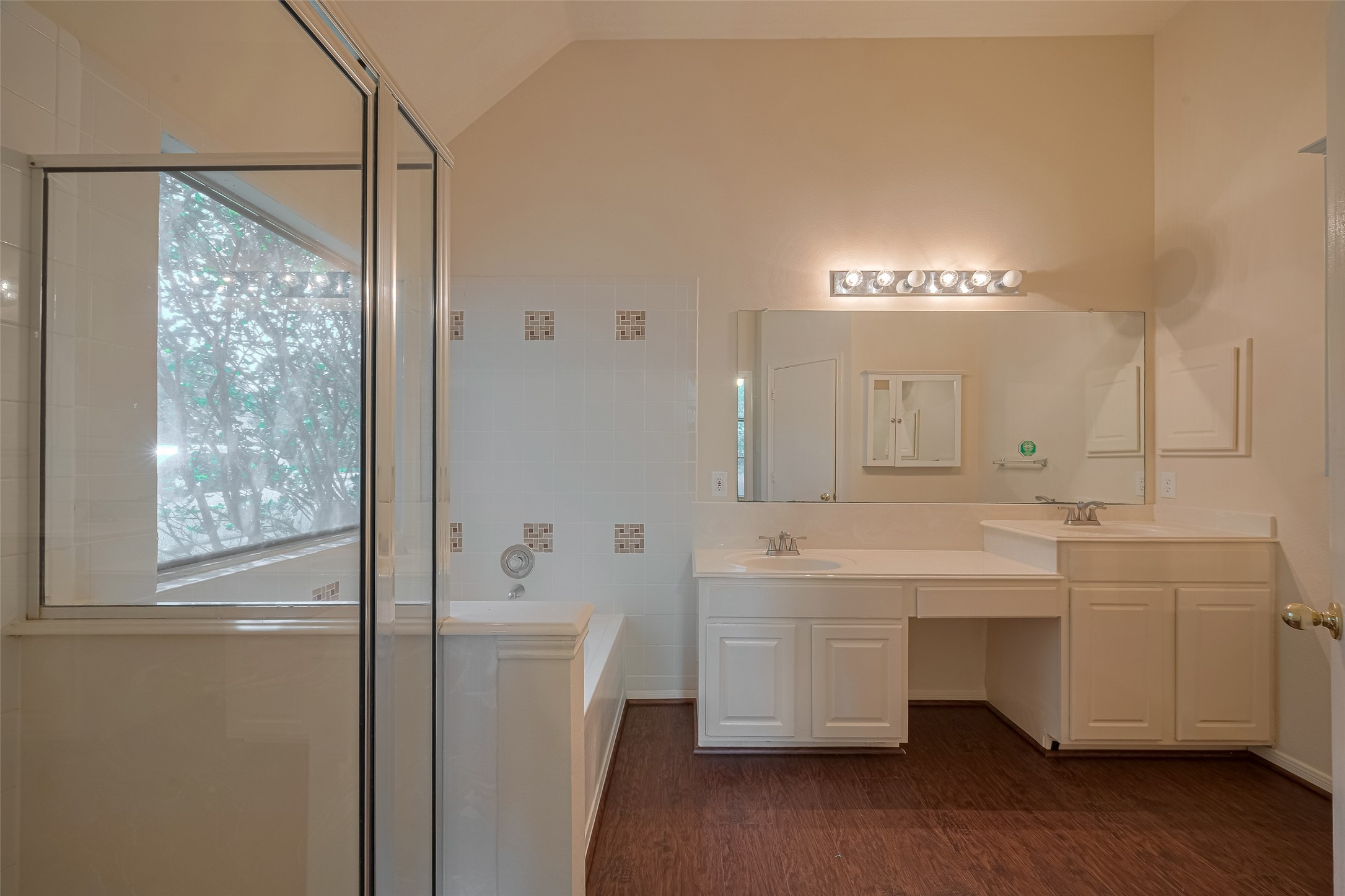 619 Bending Bough Drive Spring, TX 77388 - Photo 22 of 41 a spacious bathroom with a double vanity sink a mirror and a bathtub