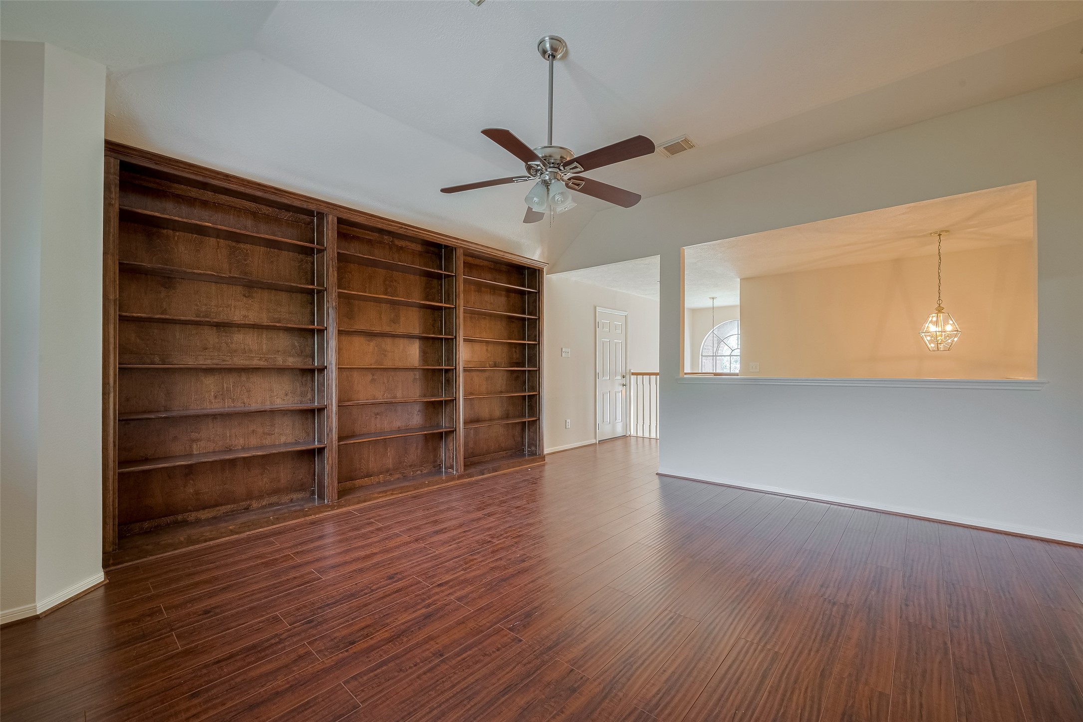 619 Bending Bough Drive Spring, TX 77388 - Photo 26 of 41 a view of an empty room with a window and wooden floor