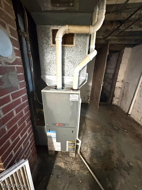 1919 Parkman Road Northwest Warren, OH 44485 - Photo 31 of 41 Furnace and the other side is a Toilet.