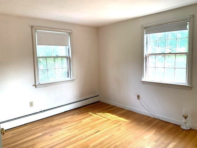 72 Bailey Lane Georgetown, MA 01833 - Photo 17 of 29 an empty room with a window