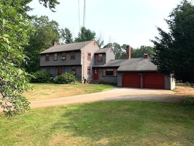 72 Bailey Lane Georgetown, MA 01833 - Photo 2 of 29 a house view with a outdoor space