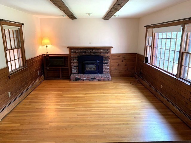 72 Bailey Lane Georgetown, MA 01833 - Photo 7 of 29 a living room with furniture and a fireplace
