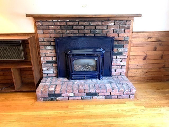72 Bailey Lane Georgetown, MA 01833 - Photo 8 of 29 a living room with furniture and a fireplace