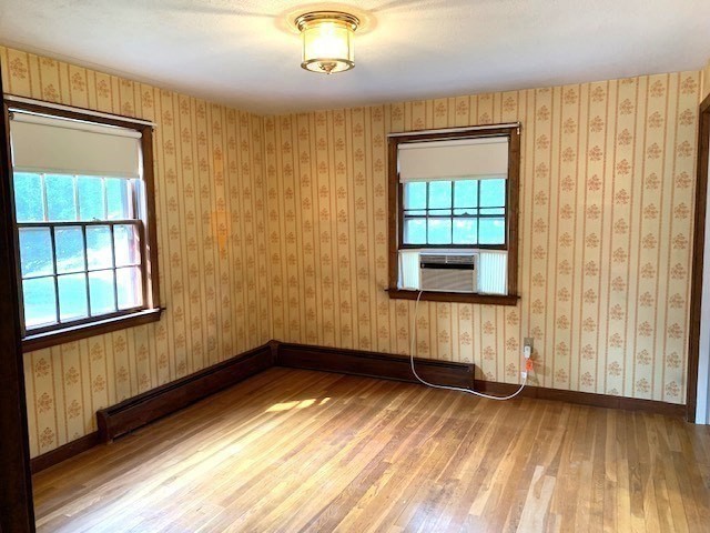 72 Bailey Lane Georgetown, MA 01833 - Photo 9 of 29 a view of empty room with wooden floor and fan