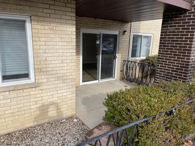 a view of a porch with a bench