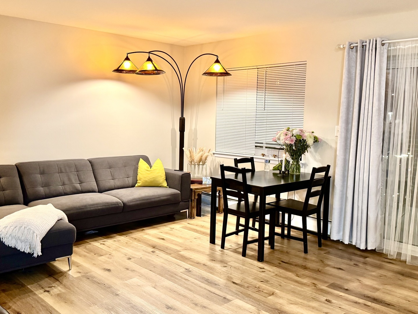 535 South Cleveland Avenue, Unit 101 Arlington Heights, IL 60005 - Photo 4 of 10 a living room with furniture and wooden floor