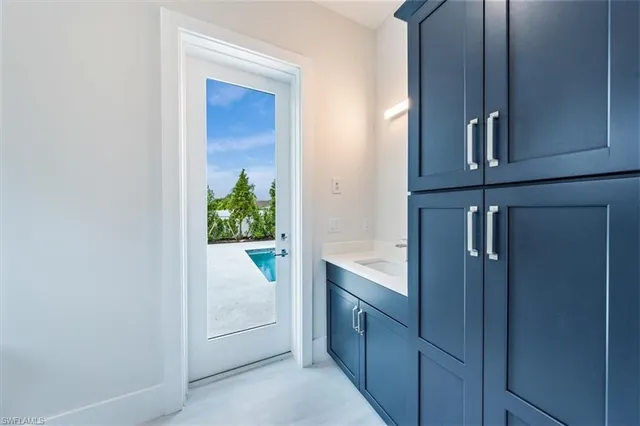 a view of hallway with washer and dryer