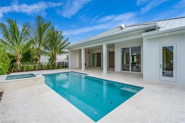 a view of a house with swimming pool