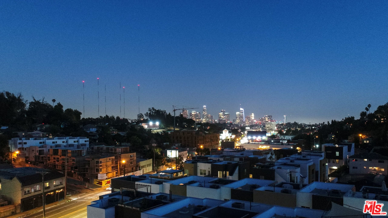 2209 Polyscope Place Los Angeles, CA 90026 - Photo 33 of 37 a view of a chairs and tables in a patio