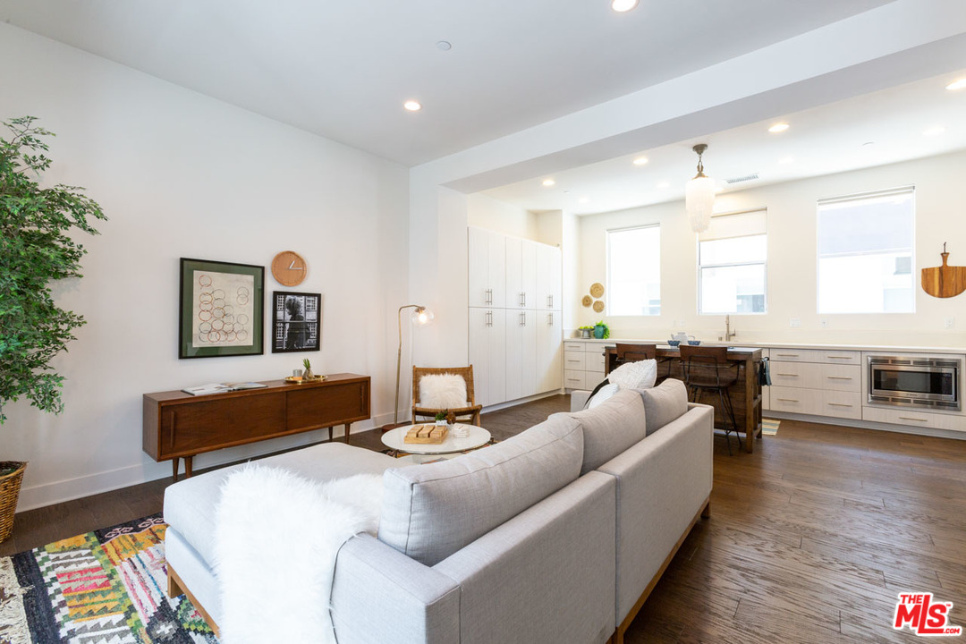 2209 Polyscope Place Los Angeles, CA 90026 - Photo 7 of 37 a living room with furniture and wooden floor
