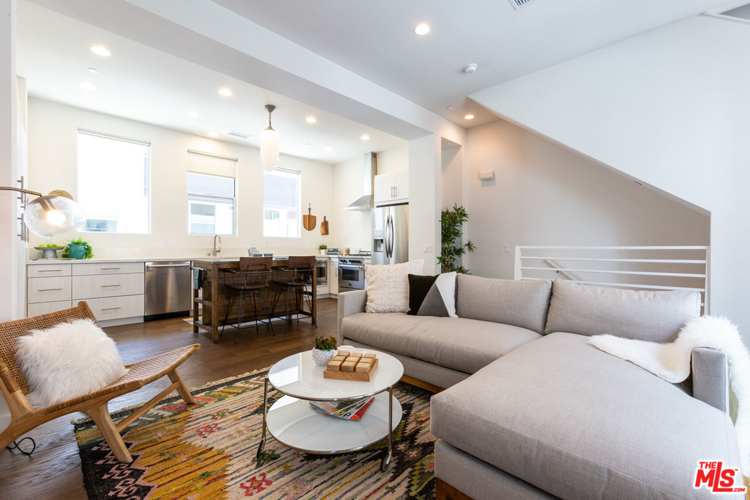 2209 Polyscope Place Los Angeles, CA 90026 - Photo 8 of 37 a living room with furniture and a table