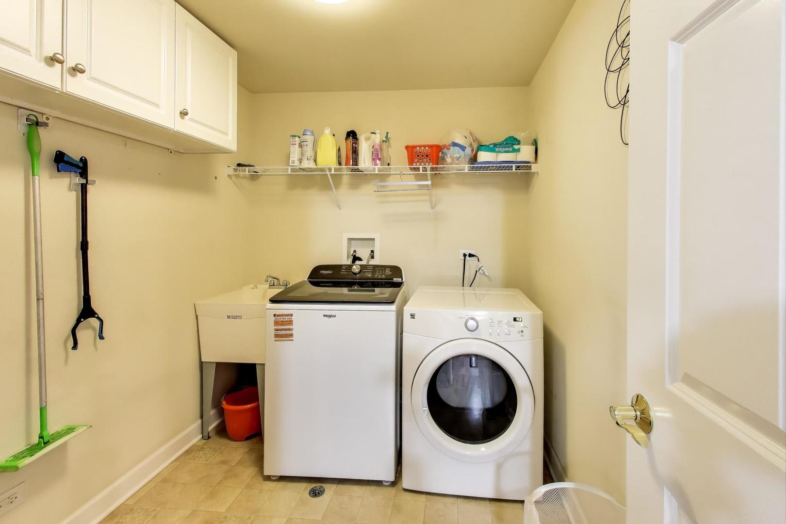 77 North Wolf Road, Unit 312 Melrose Park, IL 60164 - Photo 15 of 20 a utility room with dryer and washer