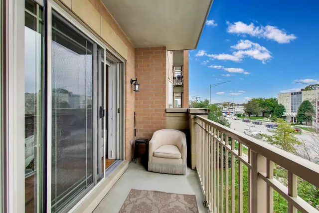 a balcony view with a potted plant