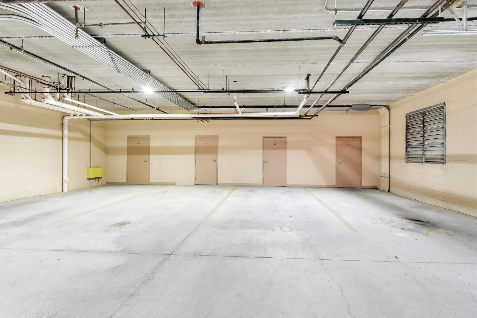 77 North Wolf Road, Unit 312 Melrose Park, IL 60164 - Photo 19 of 20 a view of a garage