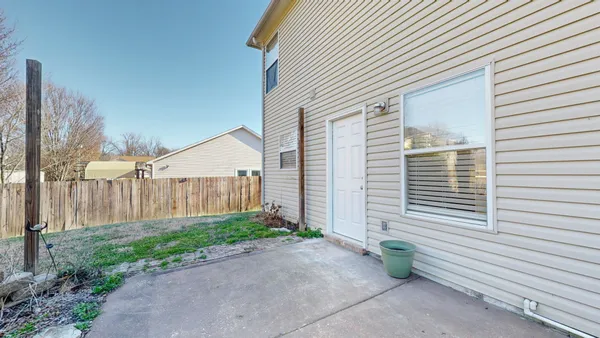 a front view of a house with a garage