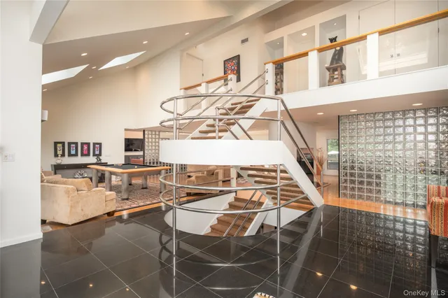 a view of kitchen with furniture and windows