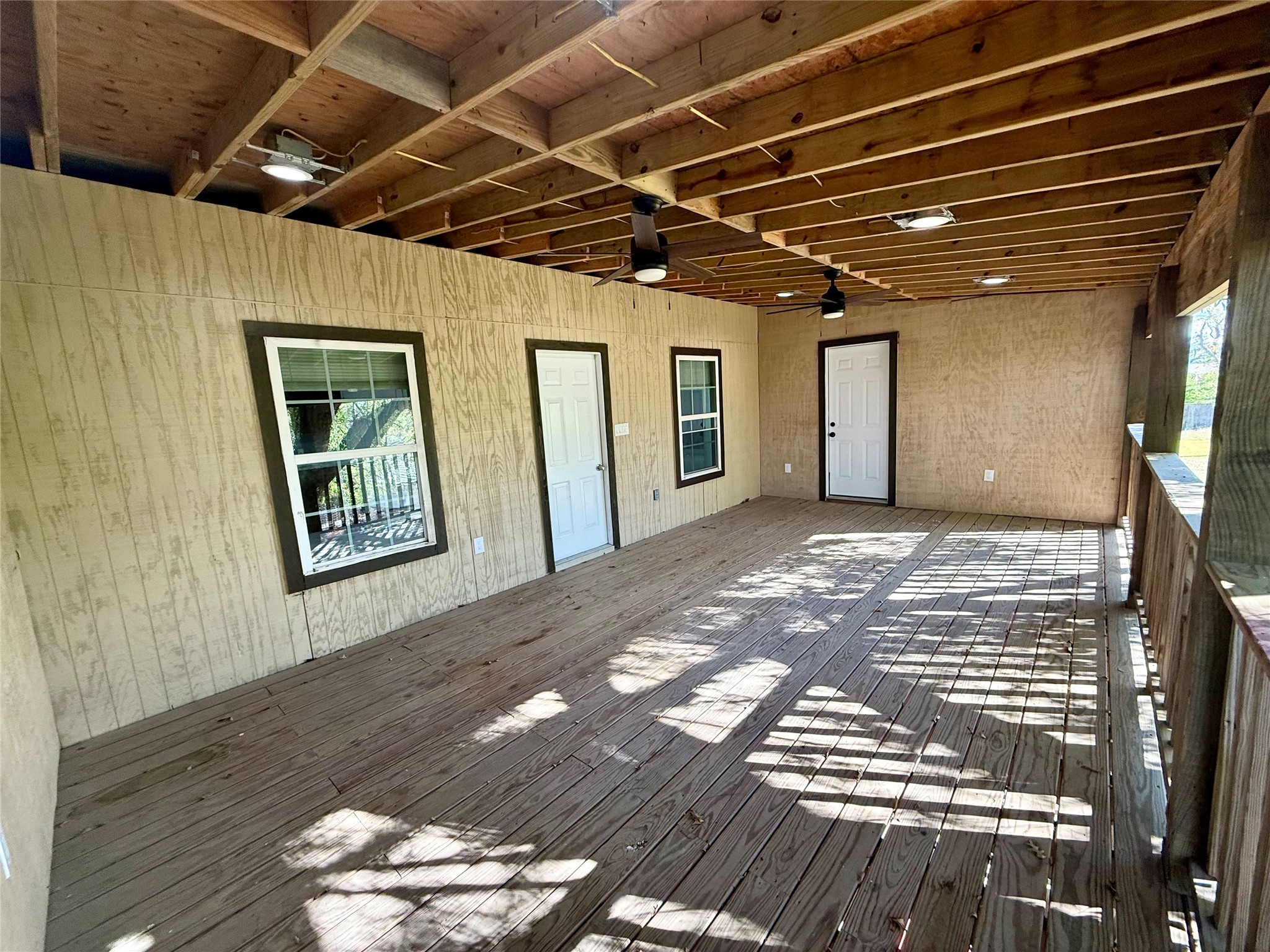 9015 Puritan Way Rosharon, TX 77583 - Photo 7 of 16 a view of porch with wooden floor