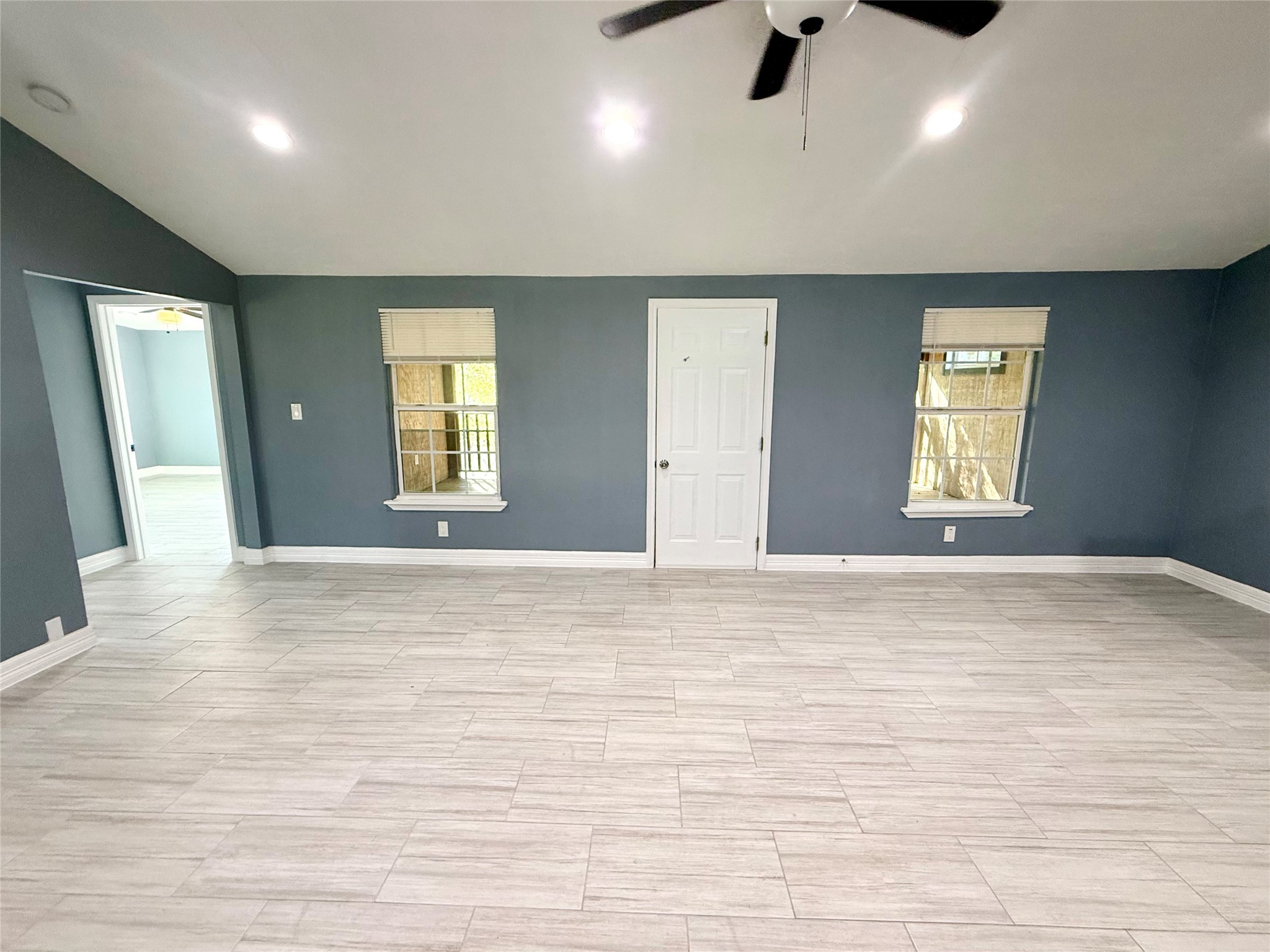 9015 Puritan Way Rosharon, TX 77583 - Photo 10 of 16 a view of empty room with wooden floor