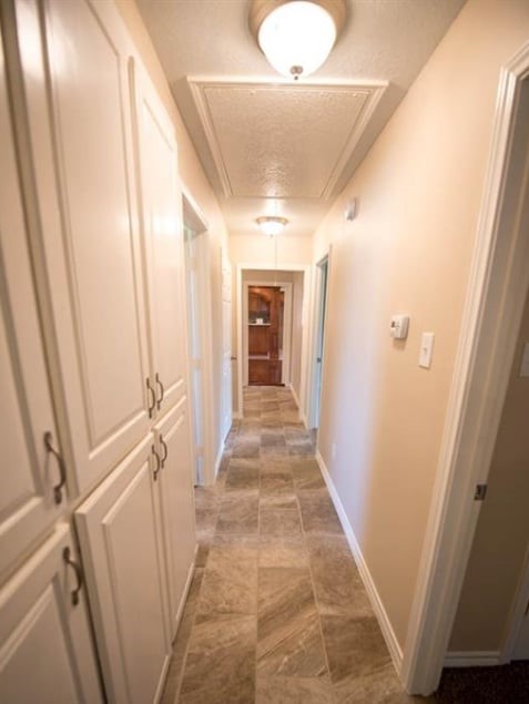 8419 Dover Street Houston, TX 77061 - Photo 13 of 15 a view of a hallway with wooden floor and staircase