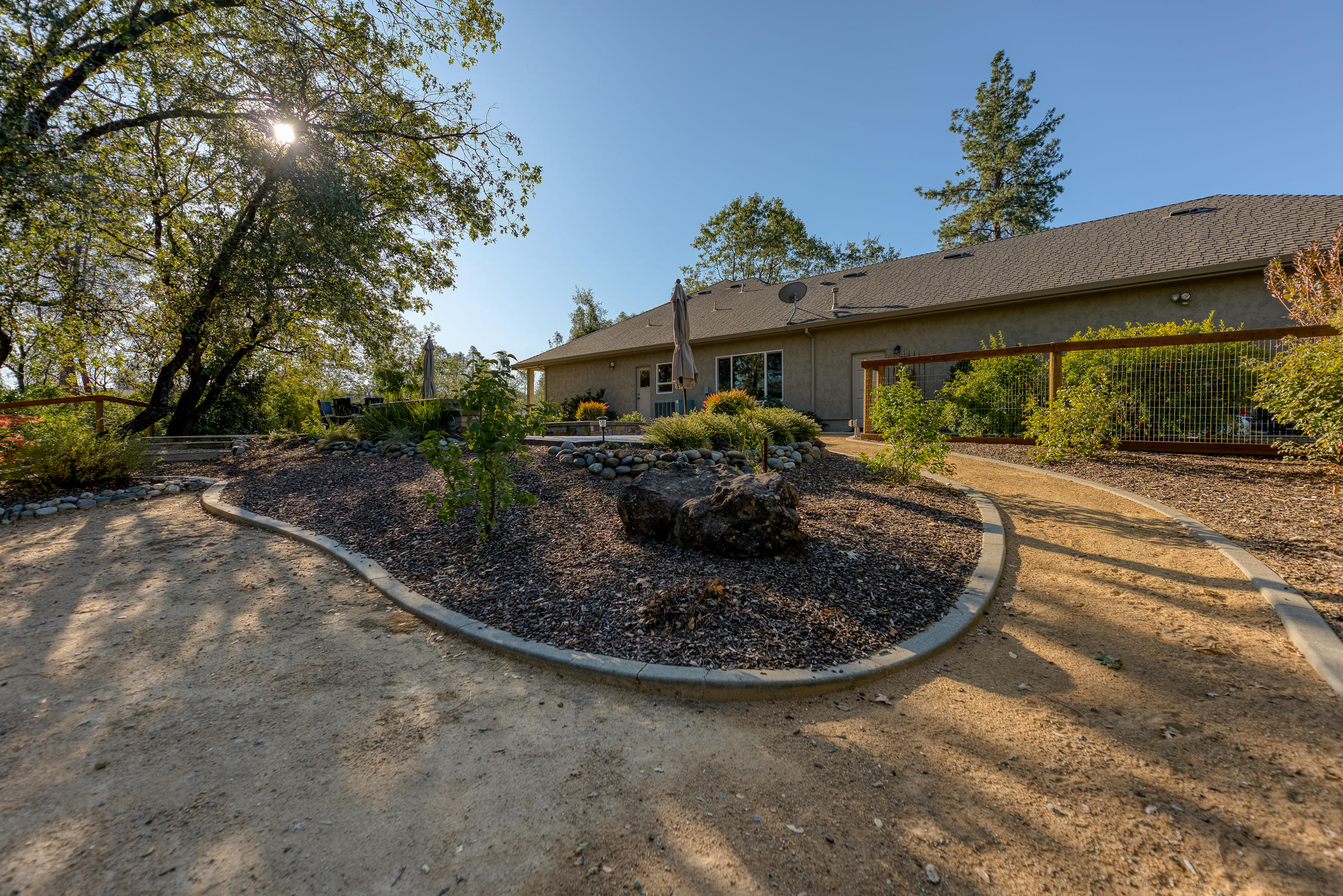10163 Tilton Mine Road Redding, CA 96001 - Photo 116 of 144 a view of a house with a porch