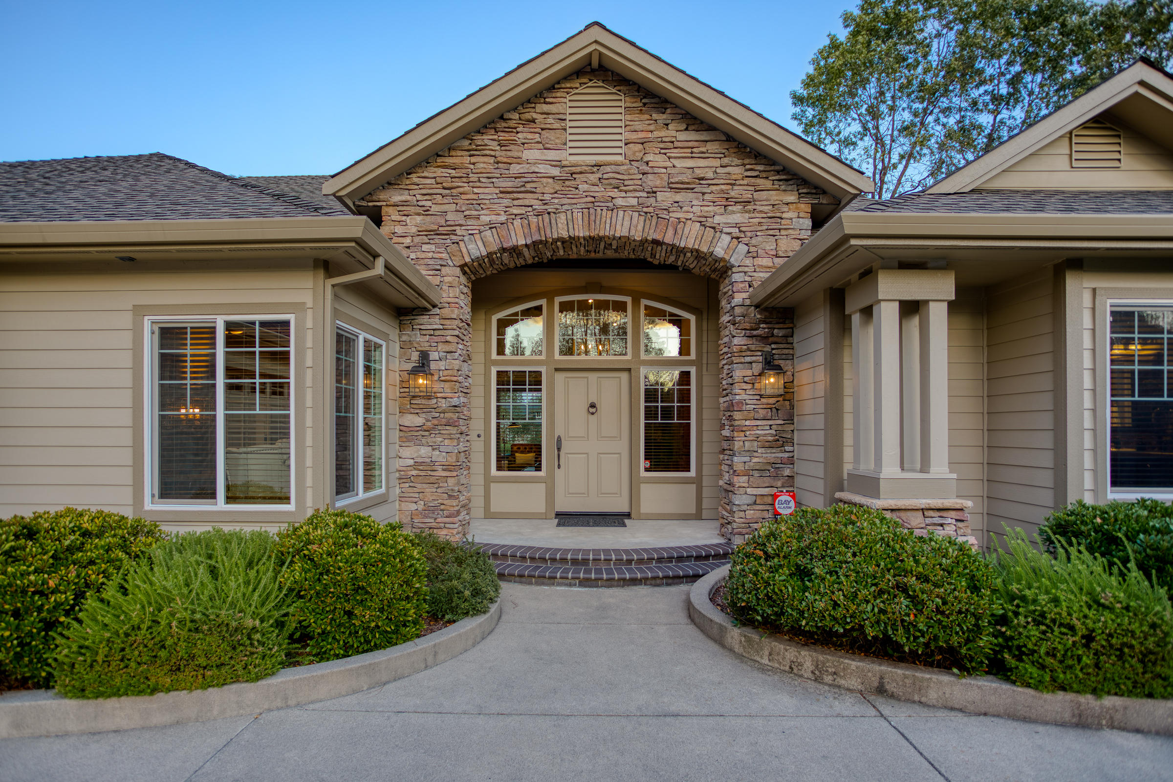 10163 Tilton Mine Road Redding, CA 96001 - Photo 141 of 144 a front view of a house with garden