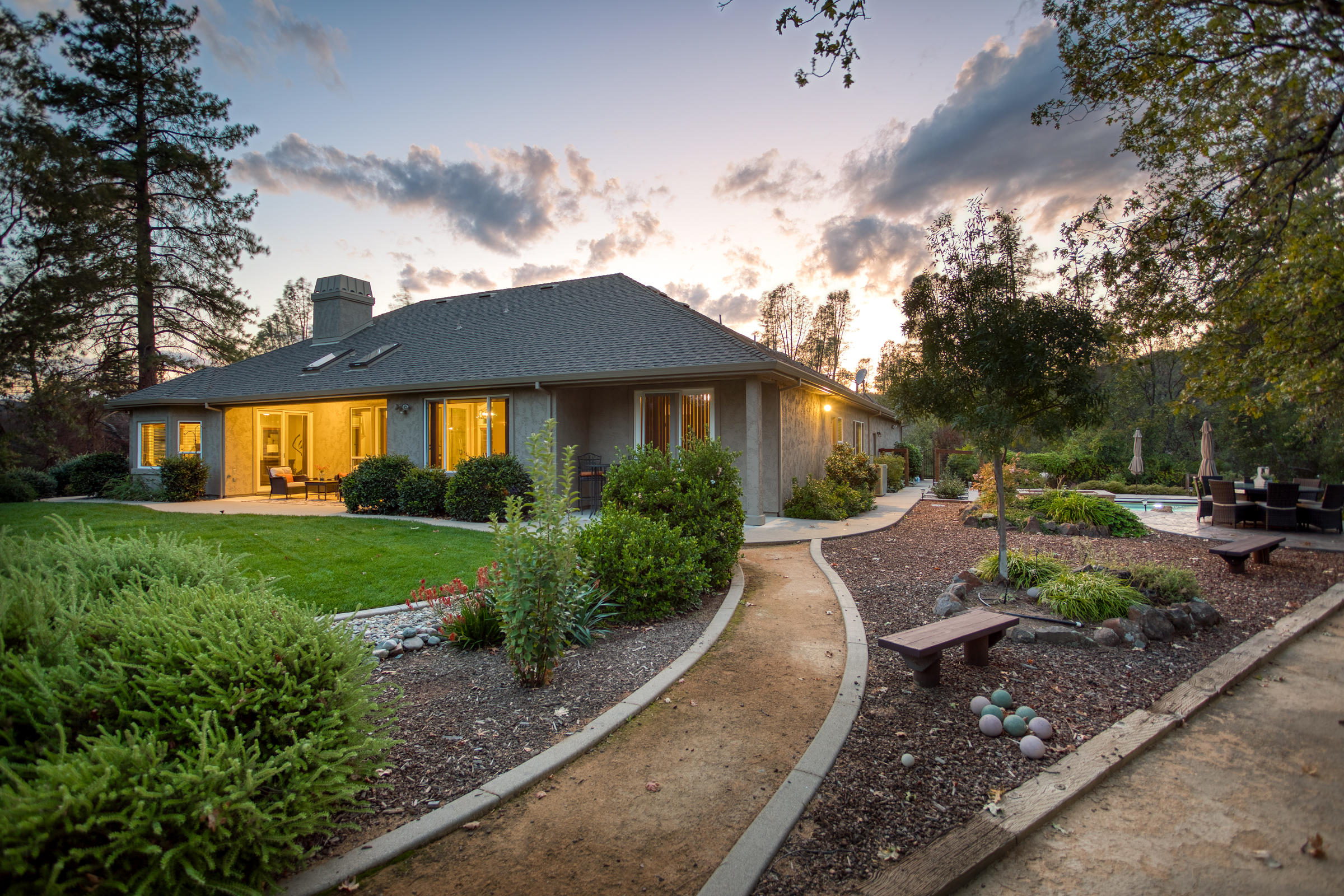 10163 Tilton Mine Road Redding, CA 96001 - Photo 38 of 144 a view of a house with backyard and sitting area