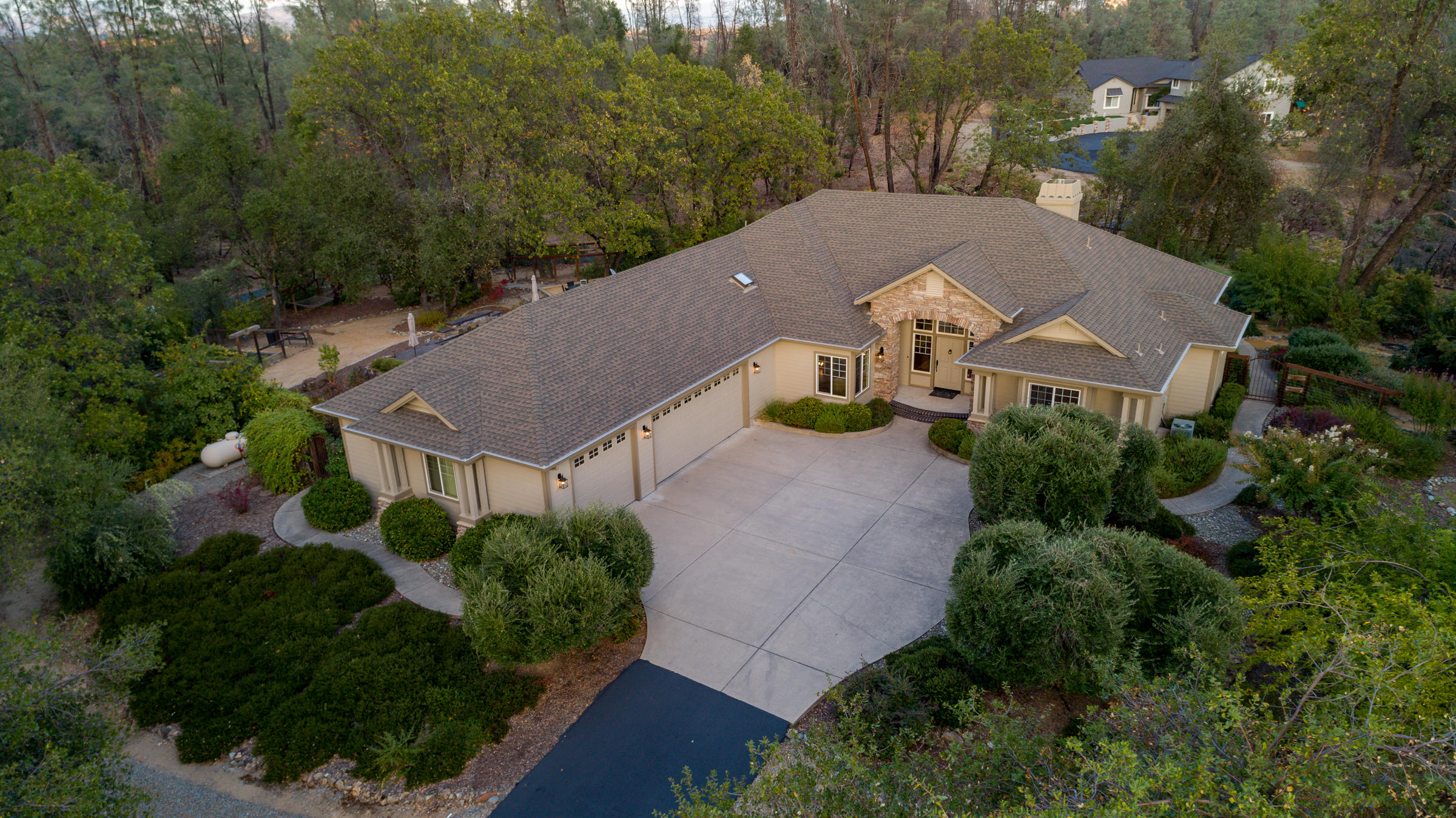 10163 Tilton Mine Road Redding, CA 96001 - Photo 50 of 144 an aerial view of a house with yard and green space