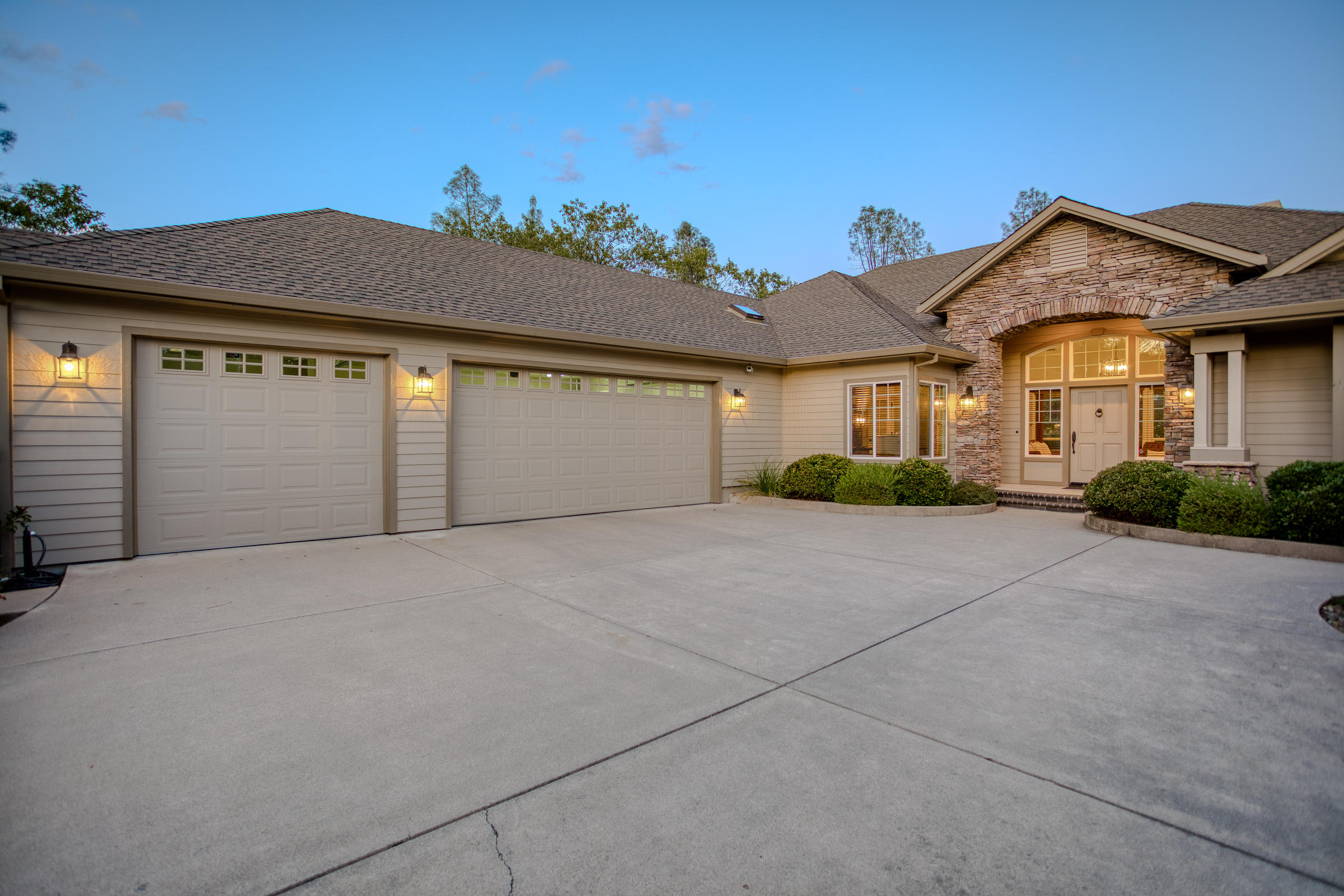 10163 Tilton Mine Road Redding, CA 96001 - Photo 54 of 144 front view of a house with a garage