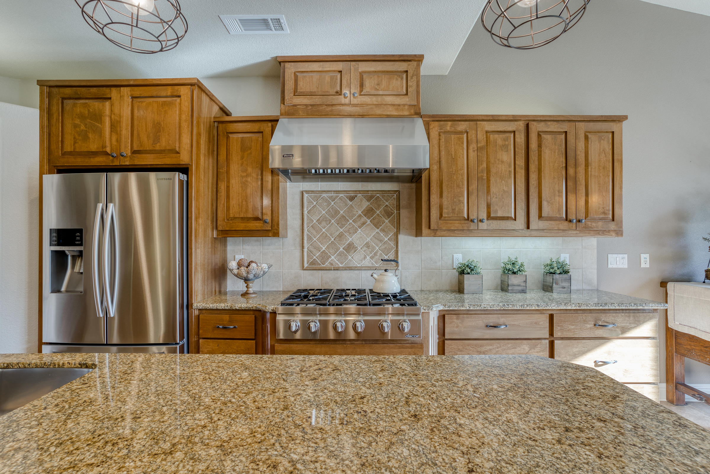10163 Tilton Mine Road Redding, CA 96001 - Photo 61 of 144 a kitchen with stainless steel appliances granite countertop a stove a sink and a refrigerator