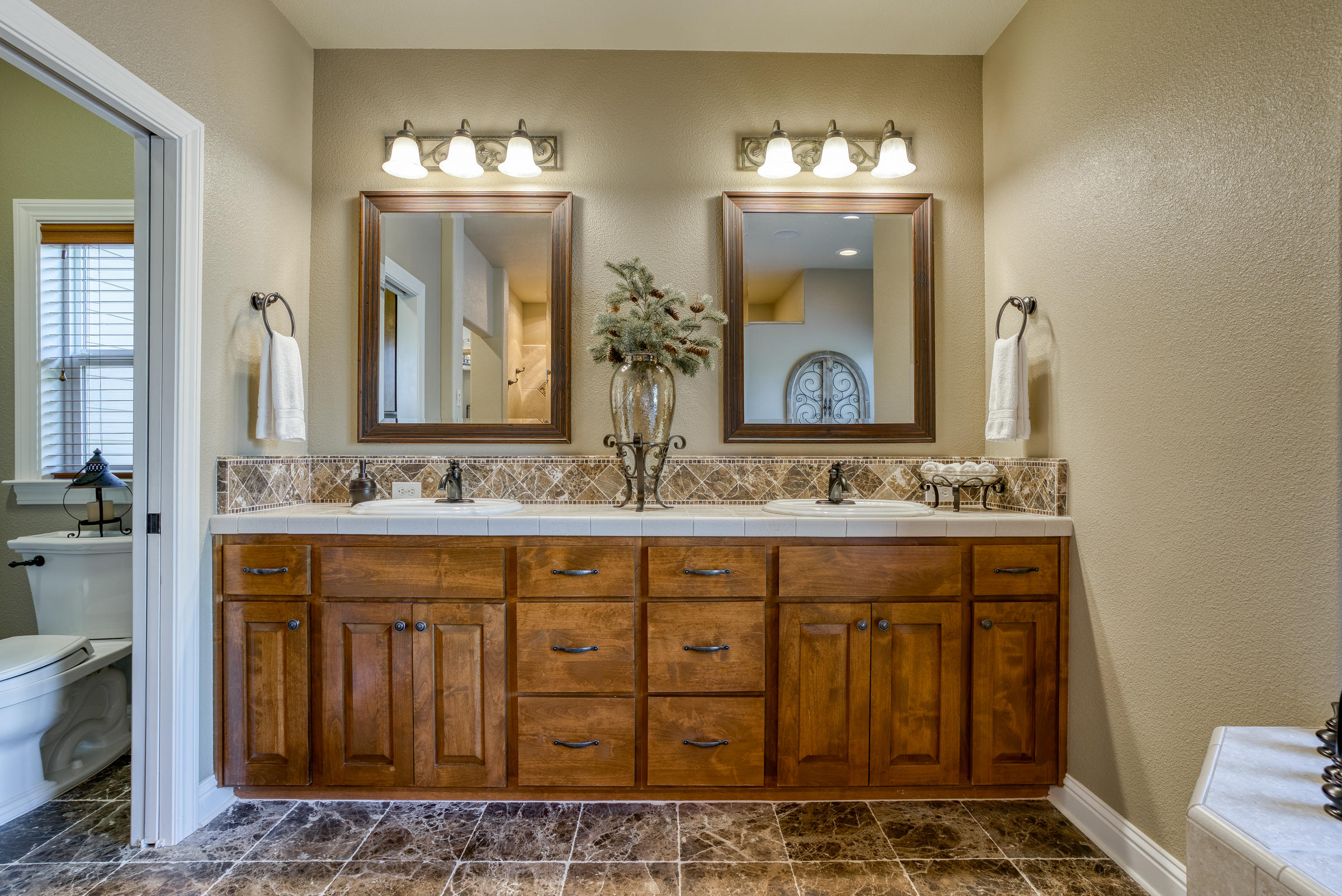 10163 Tilton Mine Road Redding, CA 96001 - Photo 73 of 144 a bathroom with a sink and a mirror