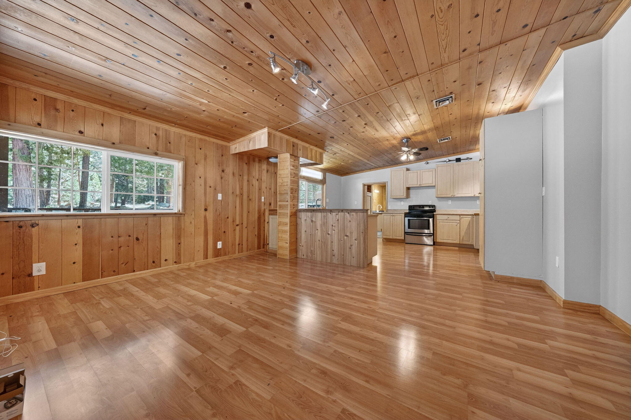 7682 Brokeoff Meadows Road Shingletown, CA 96088 - Photo 6 of 26 a view of empty room with wooden floor
