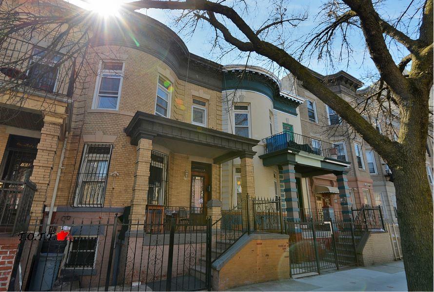 166 Martense Street Brooklyn, NY 11226 - Photo 3 of 14 a view of a house with a tree