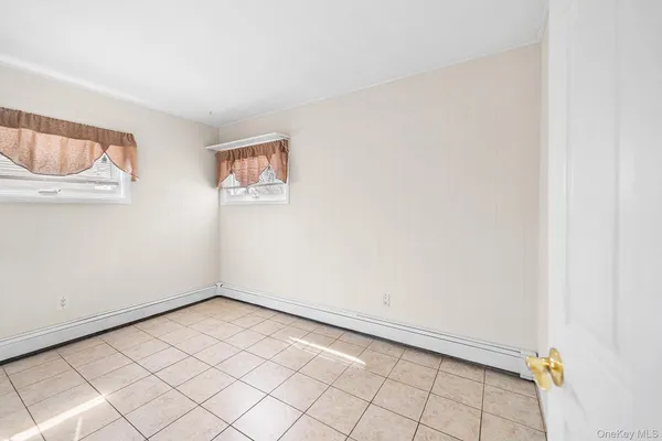 $790,000 | 116 Red Maple Drive North, Levittown, NY 11756