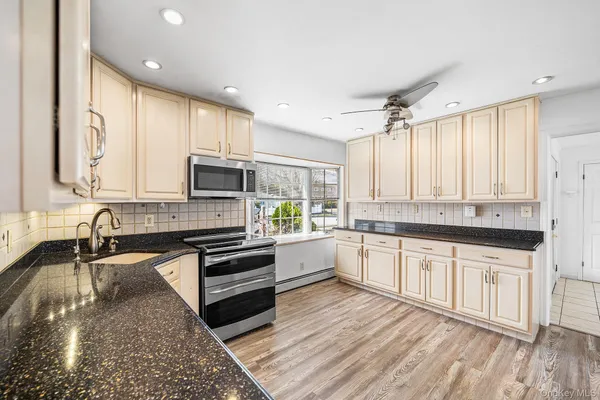 $790,000 | 116 Red Maple Drive North, Levittown, NY 11756