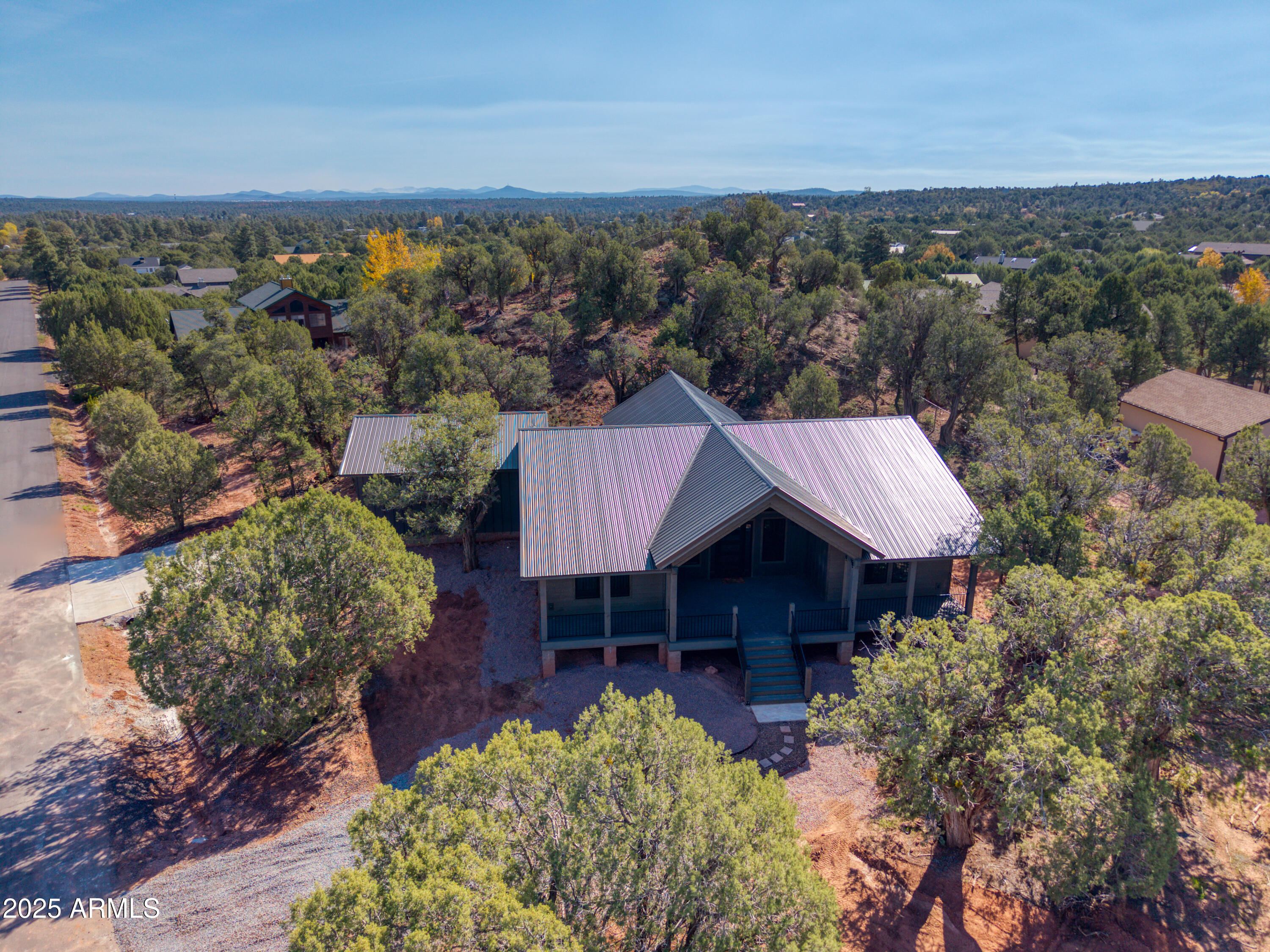 957 Cheney Ranch Loop Show Low, AZ 85901 - Photo 12 of 32 an aerial view of a house with a yard basket ball court and outdoor seating