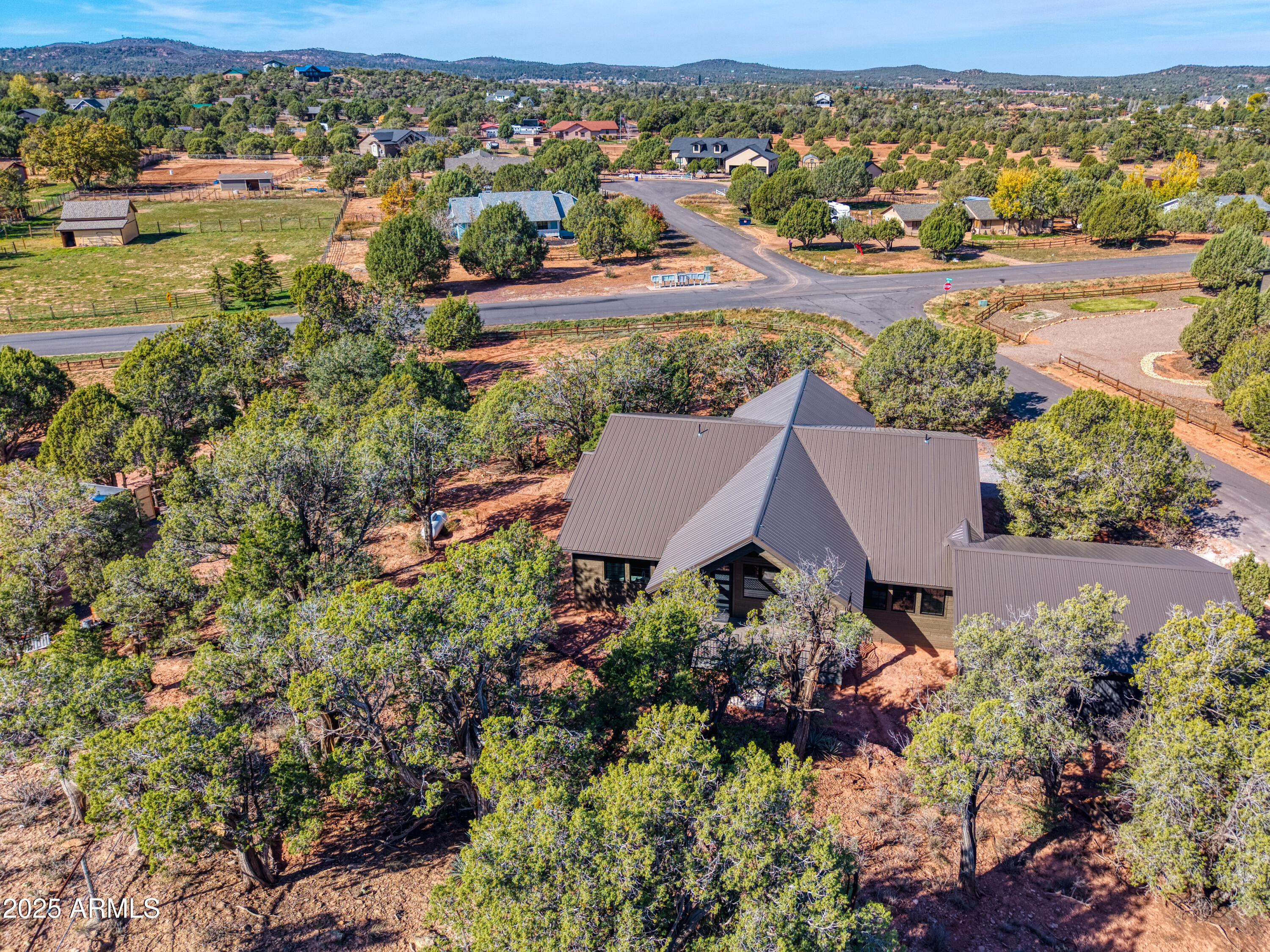 957 Cheney Ranch Loop Show Low, AZ 85901 - Photo 13 of 32 an aerial view of residential houses with outdoor space